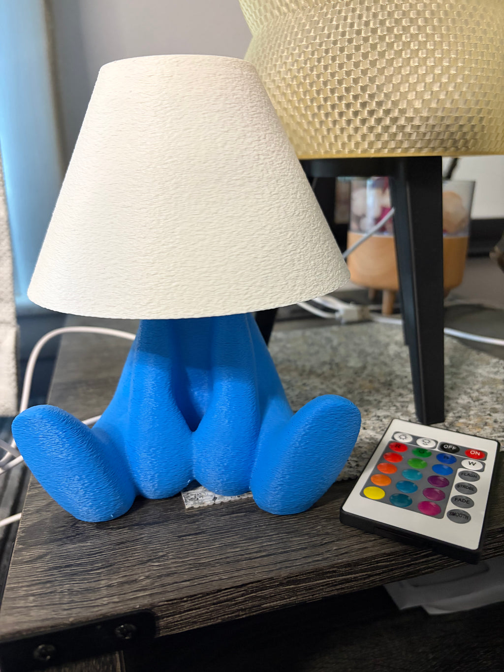 Loopy Lamp (Shy Version) featuring a cute character design illuminated in a vibrant blue ambient glow.