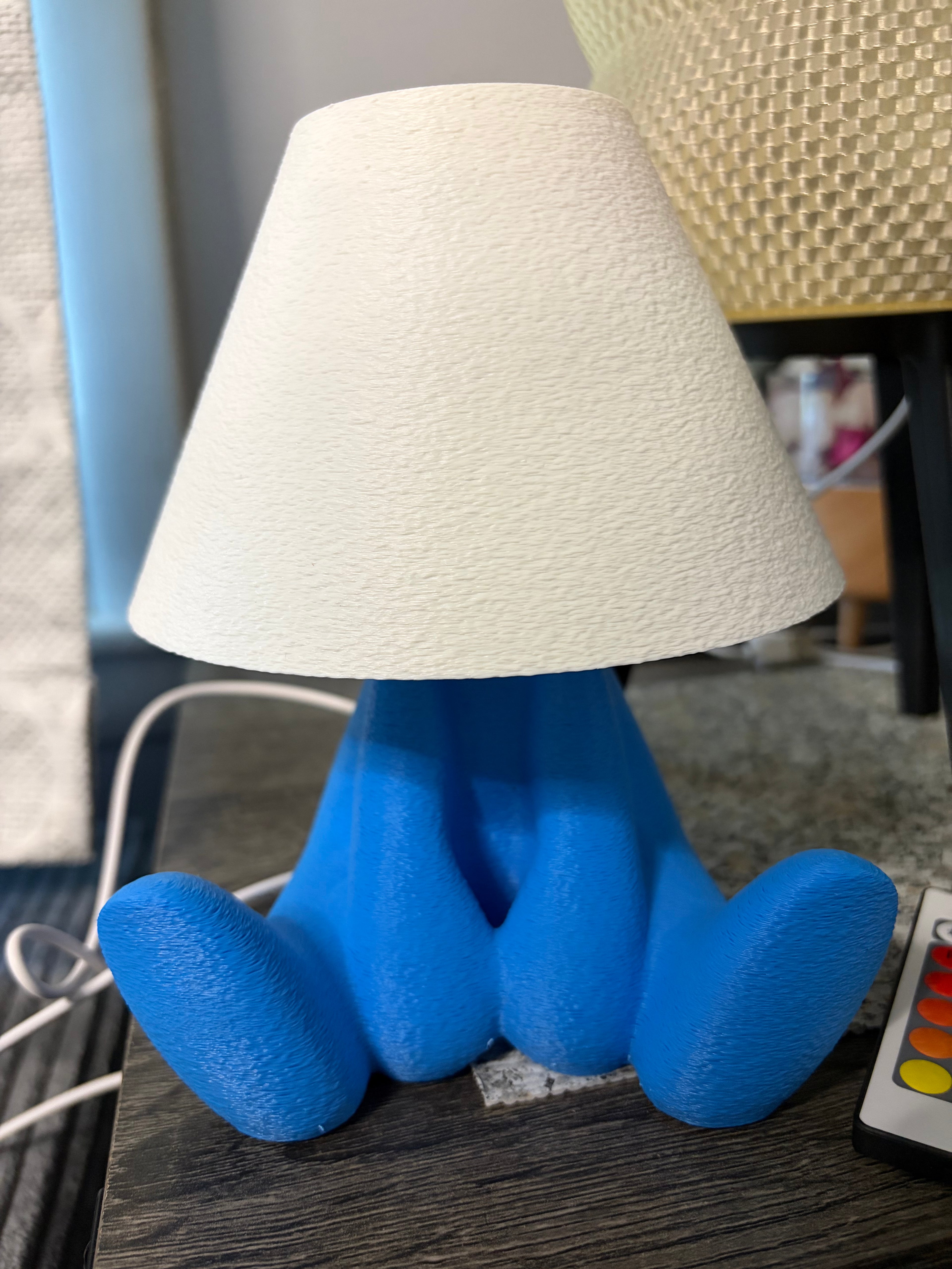 Loopy Lamp (Shy Version) featuring a cute character design illuminated in a vibrant blue ambient glow.