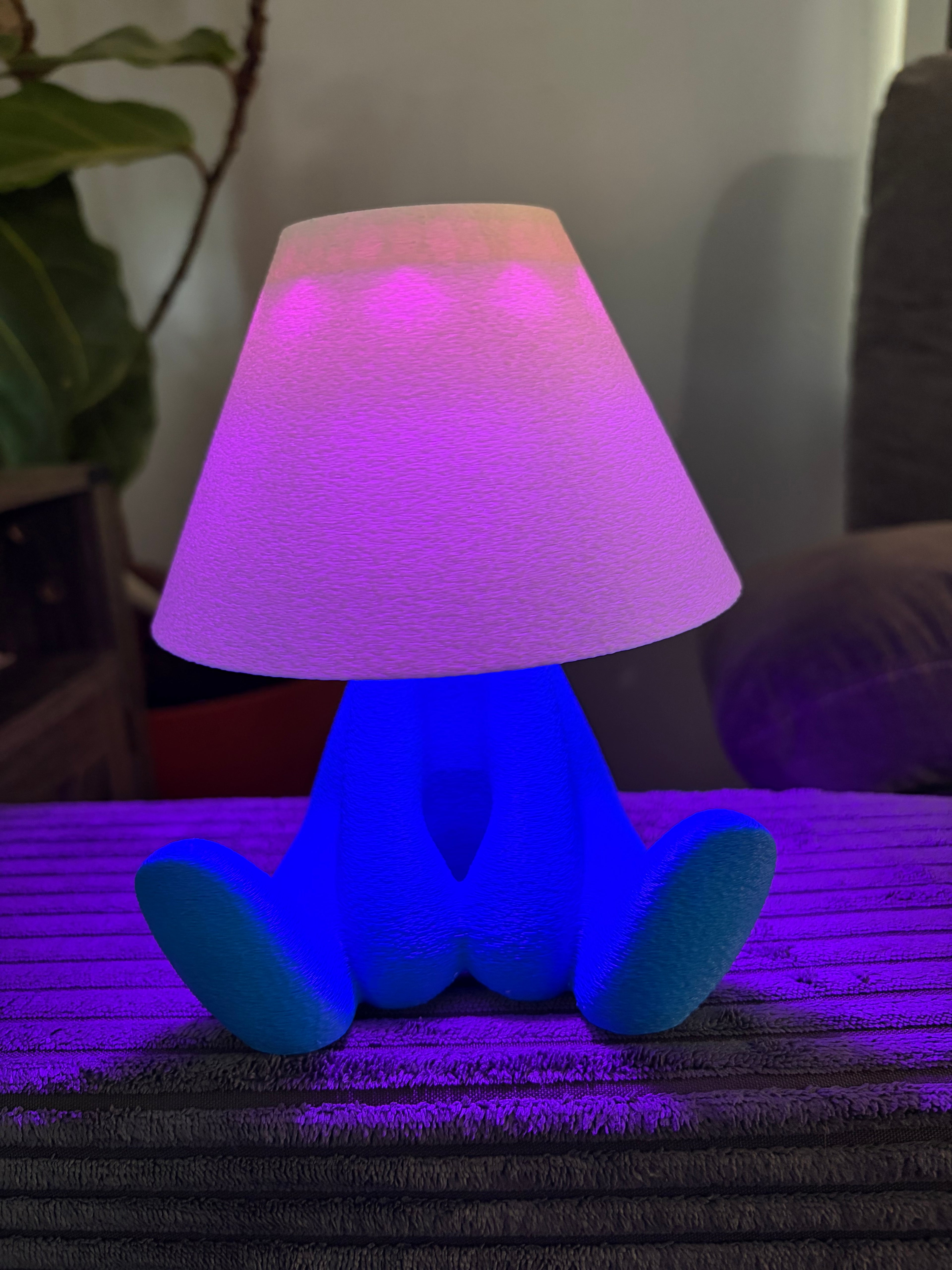 Loopy Lamp (Shy Version) featuring a cute character design illuminated in a vibrant blue ambient glow.