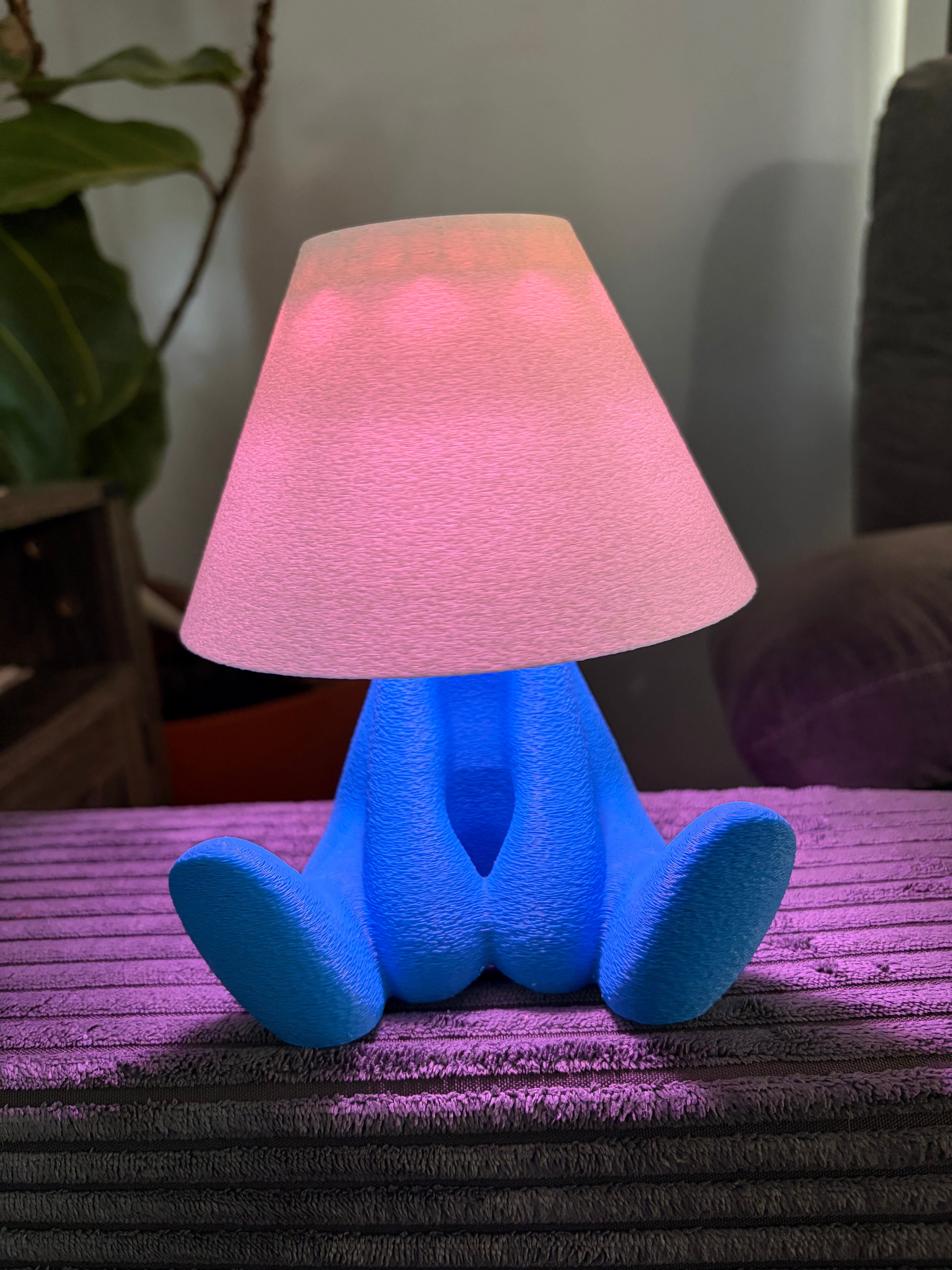 Loopy Lamp (Shy Version) featuring a cute character design illuminated in a vibrant blue ambient glow.
