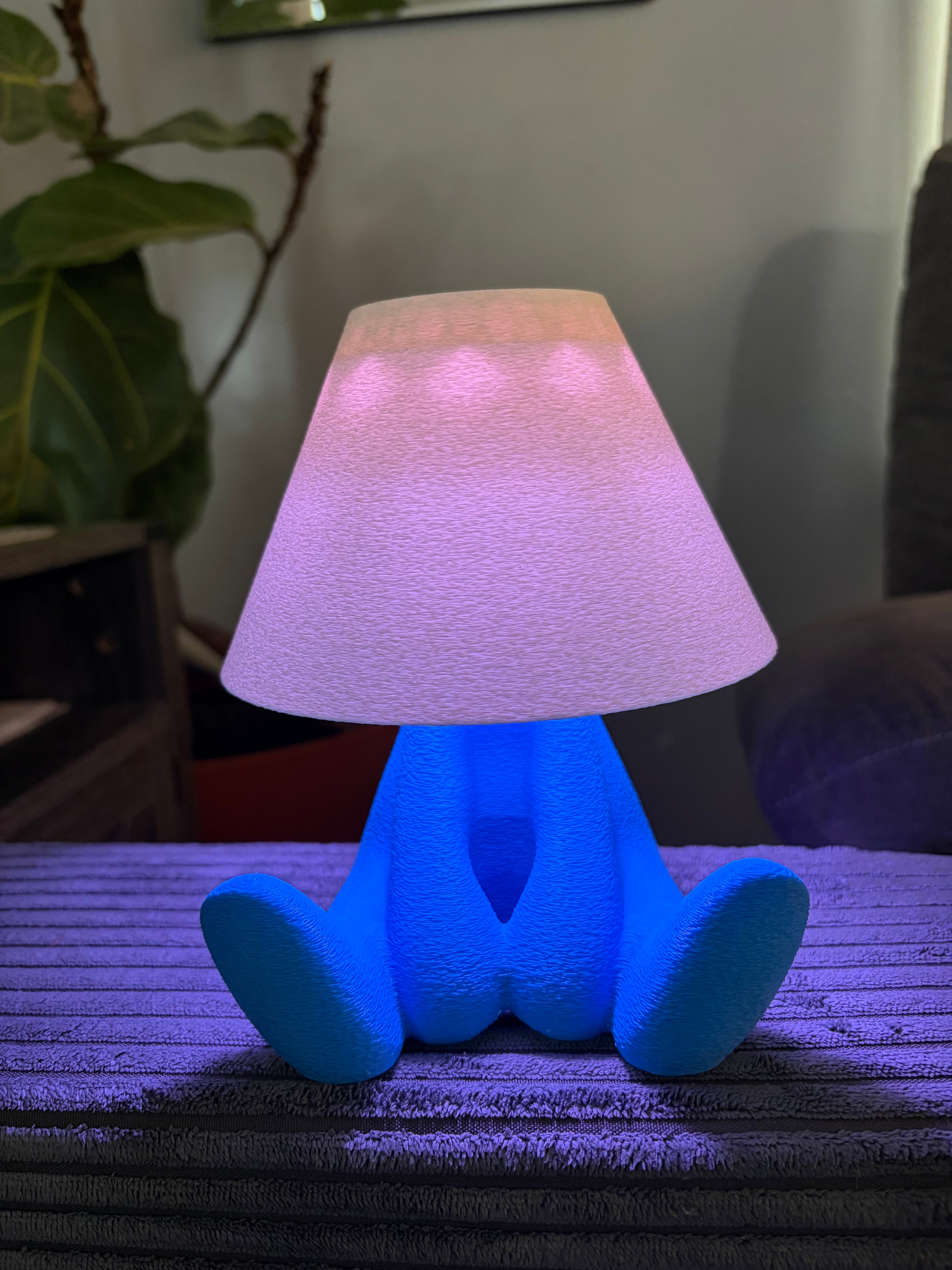 Loopy Lamp (Shy Version) featuring a cute character design illuminated in a vibrant blue ambient glow.