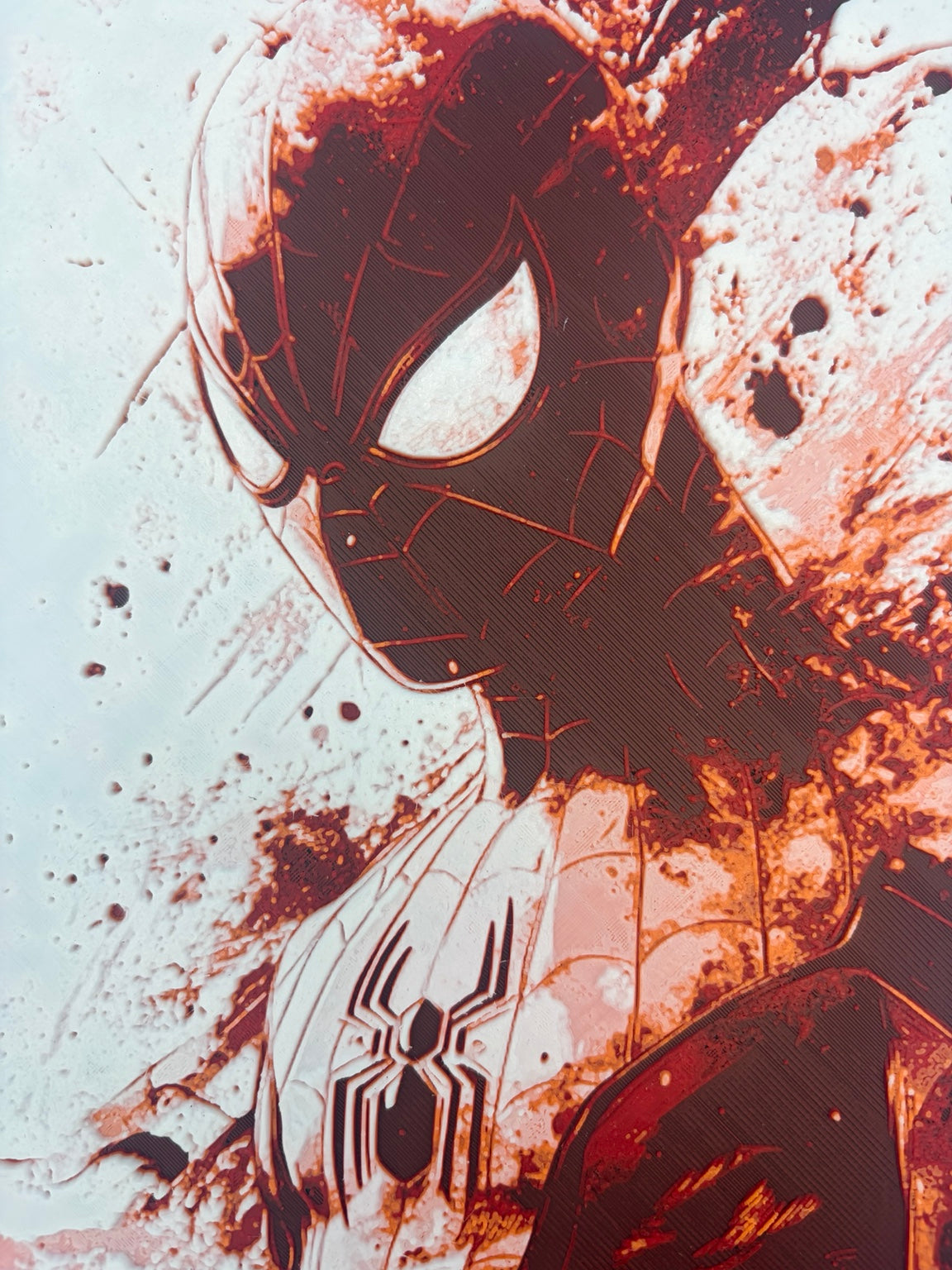 Close-up of the layered Spider-Man artwork texture