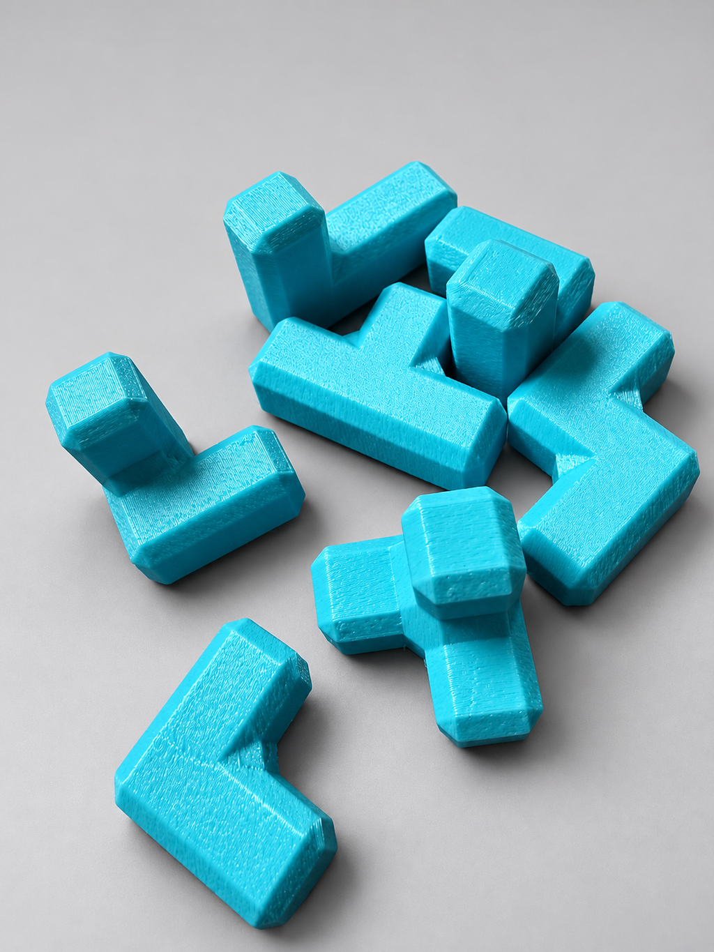 Turquoise interlocking cube puzzle fidget toy