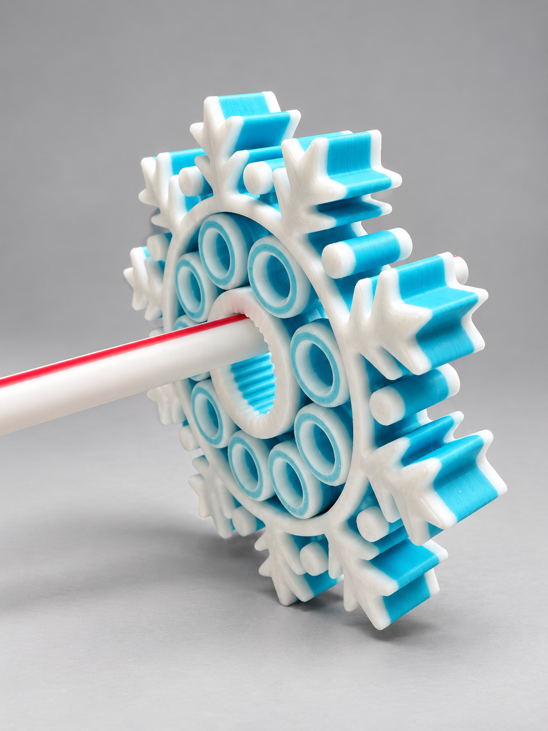 Turquoise and white snowflake fidget toy