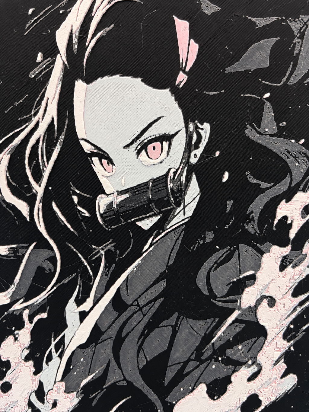 Close-up of Nezuko layered 3D-printed artwork