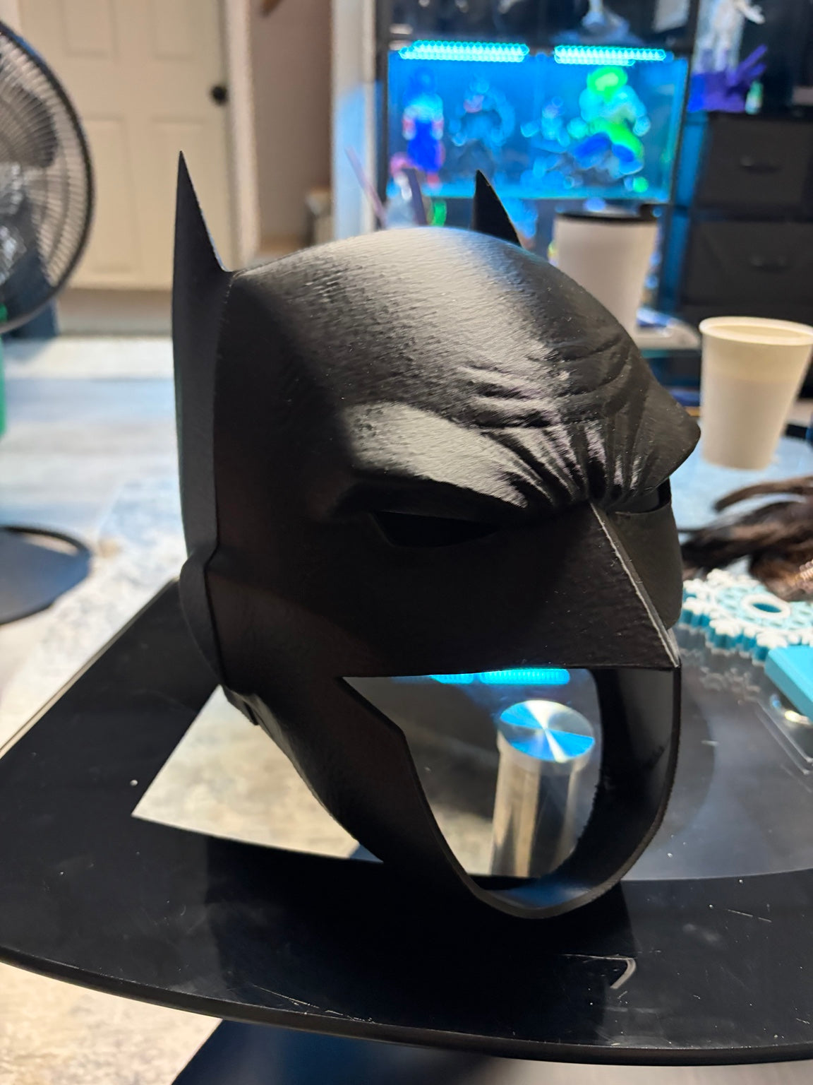 Three-quarter view of black 3D-printed Batman cowl mask