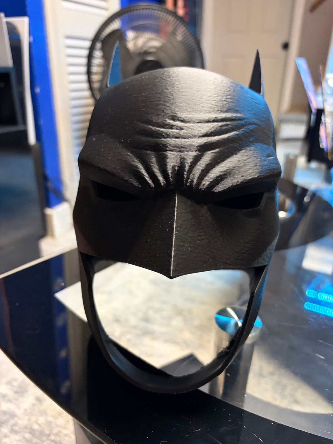 Front view of black 3D-printed Batman cowl mask