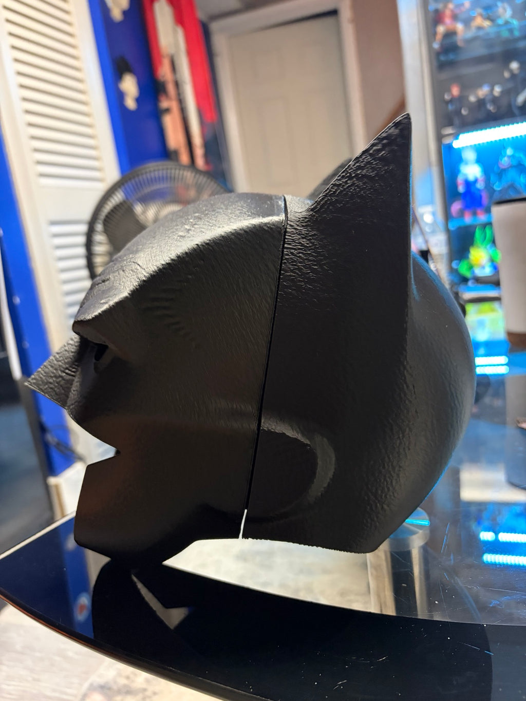 Side view of black 3D-printed Batman cowl mask