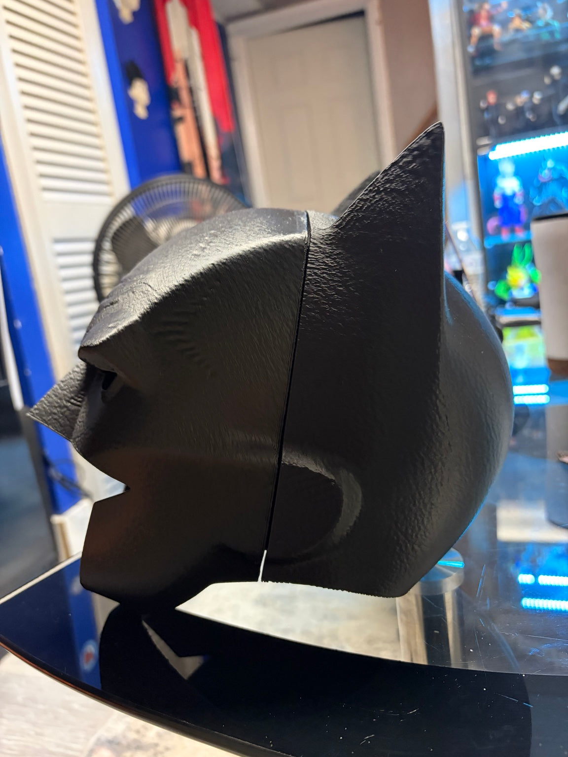 Side view of black 3D-printed Batman cowl mask