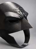 Close-up of black 3D-printed cowl mask with sculpted brow and open lower face