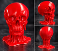 Red melting skull sculpture front side and back