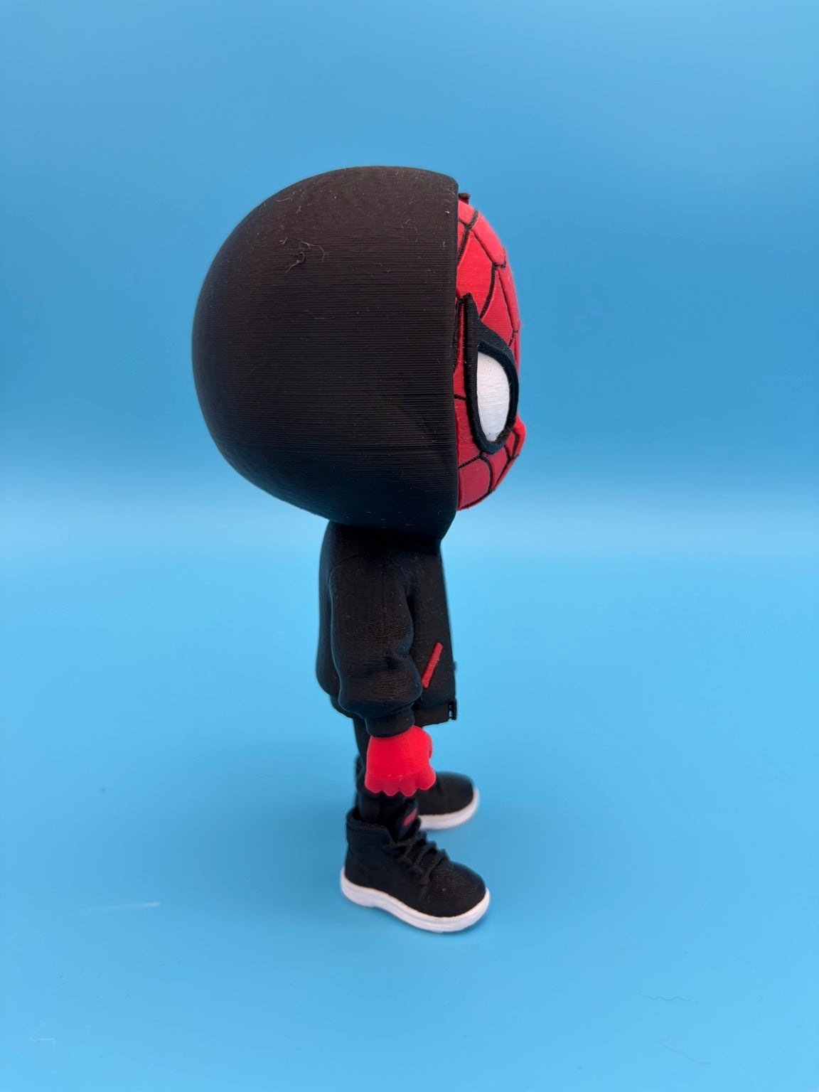 Side view of 6-inch hooded Spider-Man 3D-printed figure